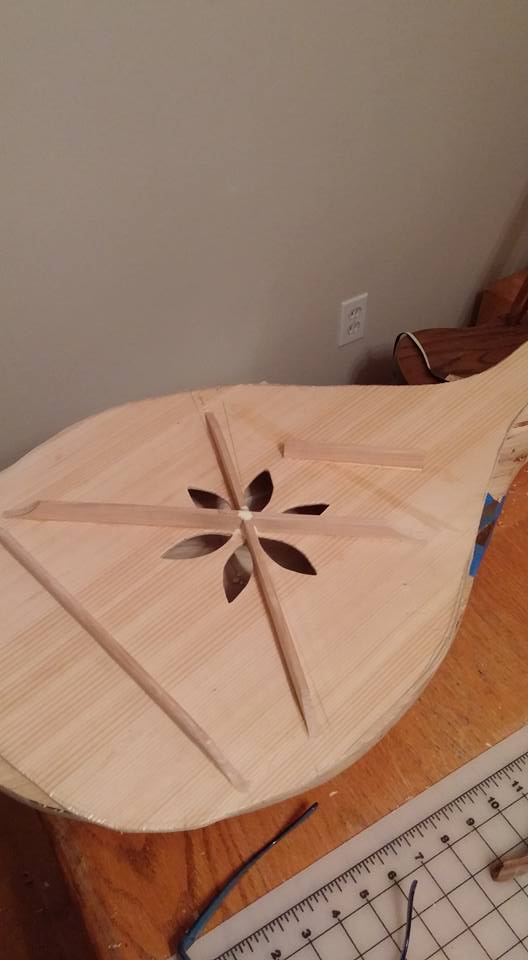 In process bandura soundboard on workbench